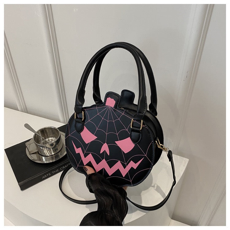 black & pink pumpkin purse