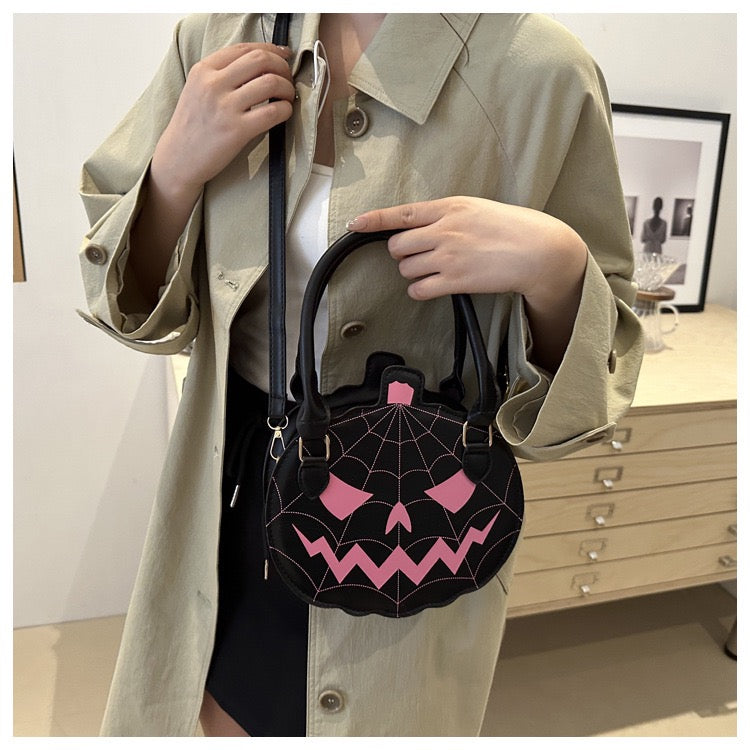 black & pink pumpkin purse